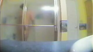 A girl took shower, not knowing that someone filmed her