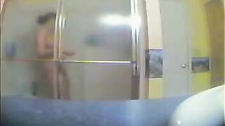 A girl took shower, not knowing that someone filmed her