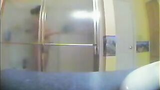 A girl took shower, not knowing that someone filmed her