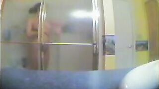 A girl took shower, not knowing that someone filmed her