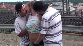An amateur brunette has a hot threesome sex with two guys in this steamy scene