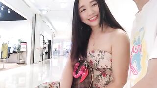 An appetizing young Asian girl seduces passersby to have sex with her