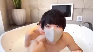 Japanese guy with huge cock uses cum lube in a steamy bathroom session