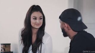 A schoolgirl is having fun with her boyfriend on the couch