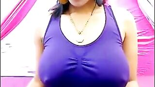 Nipples stand out through a white T-shirt when excited