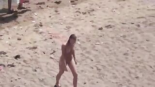 A pair of naked people enjoy each other on the sea