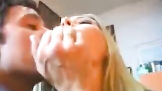 A blonde is having fun with a couple of rich guys