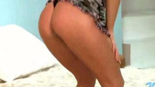 A young Russian debauchery removes her clothes on the camera in a sensual way
