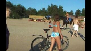 A topless beauties enjoy the sunny day in a pleasant weather