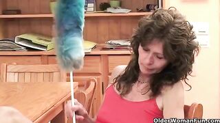 A mature woman plays with her vagina