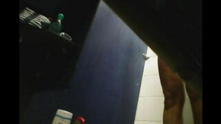 A girl has no shame and caresses herself in the shower, unaware of being watched