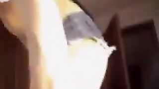 A stunning Russian woman with big natural tits gets undressed on webcam