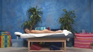 A masseur gives an erotic massage to his young and sexy client