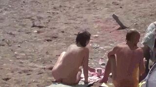 Nude beauties bathing in the sea