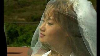 An Asian girl is fucking on the tennis court with a guy
