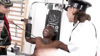 A negro guy fucks two girls in a latex suit