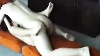 A married couple have fun at home, getting down and dirty