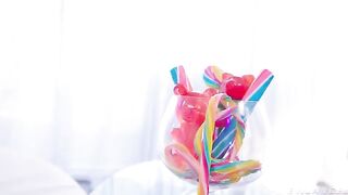 A girl has sex with a vibrator in full latex clothes