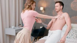 Two lovers have a conversation while lying on the bed naked