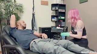 A hot girl with a tattoo is having fun with a guy