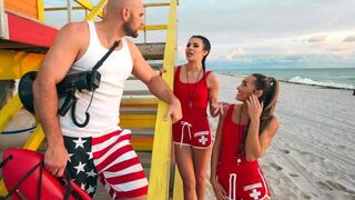 Two young lifeguards are having fun with one guy in an FFM threesome