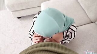 A man wearing a hijab caught a girl on the couch with his dick