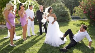 The bride chills with the guys in a steamy pre-wedding session