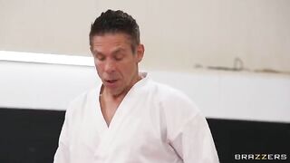 A girl gets fucked in an uncomfortable pose by her trainer