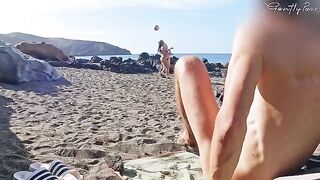 Nude beauties got acquainted with a familiar guy on the beach and gave him a blowjob