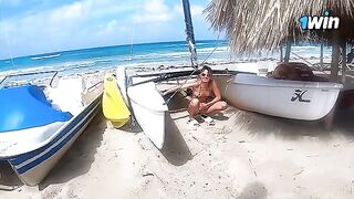 A couple enjoys passionate and rough sex right on the nude beach