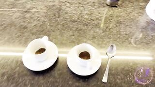 The little baby is showing what she can do in the kitchen