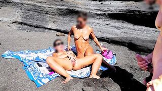 Nude beauty has an orgasm while rubbing herself on the beach
