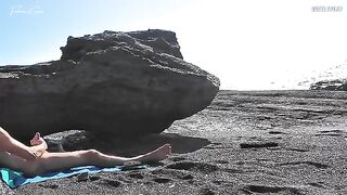 Nude beauty has an orgasm while rubbing herself on the beach