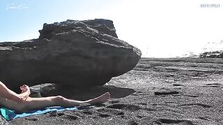Nude beauty has an orgasm while rubbing herself on the beach