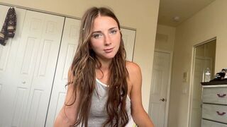 A step sister is getting ready to take off her clothes very quickly