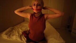 Girl plays a sexy role, teasing with her gaze
