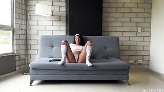 A cute girl fucks like a slut in her ass, showcasing her talent